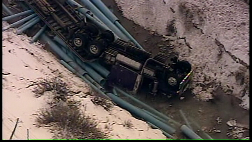 Semi Truck Rolls Into Spanish Fork River