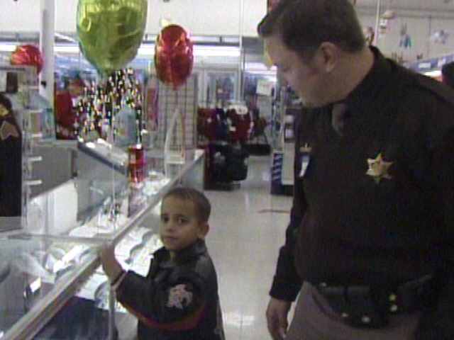 Children Shop with a Cop