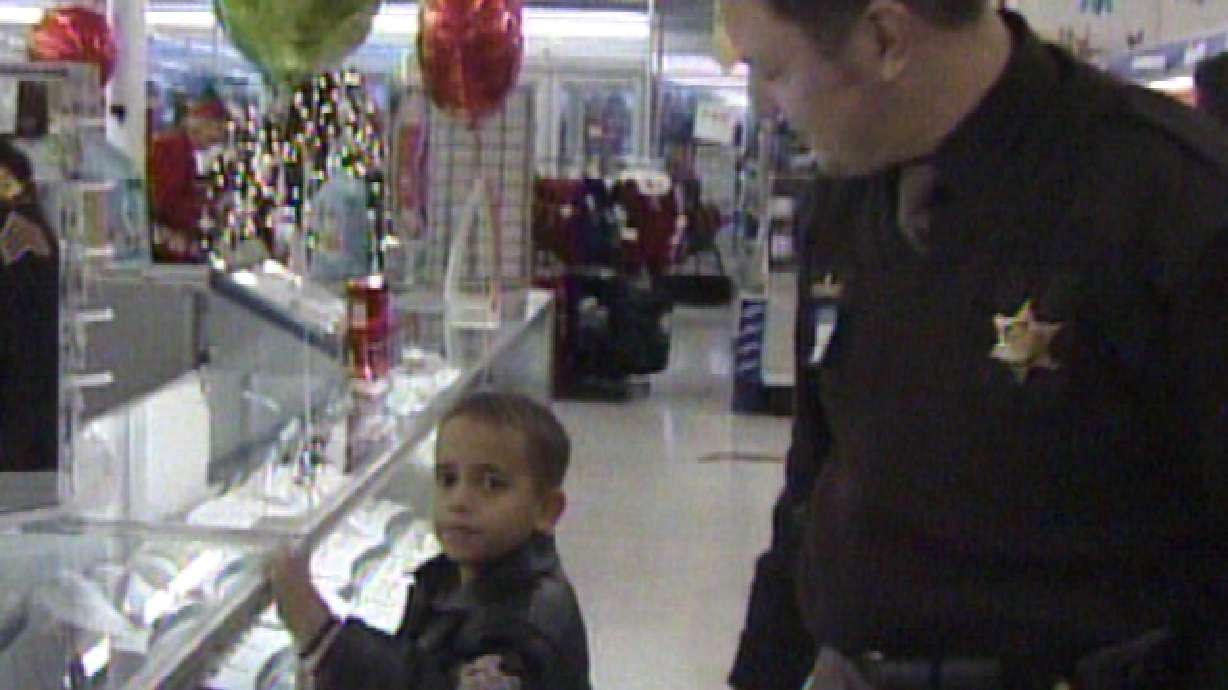 Children Shop with a Cop