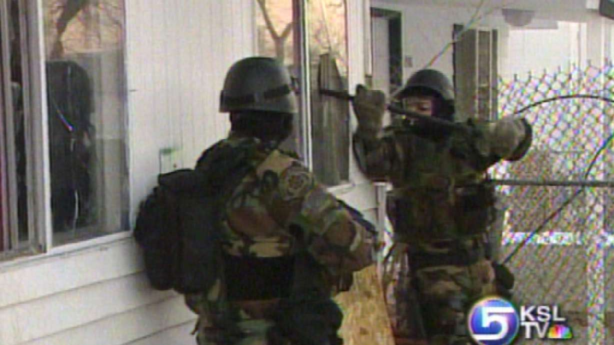 SWAT Team Trains in Abandoned House