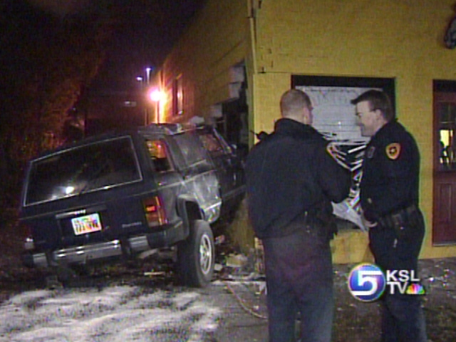 Car Crashes into Building