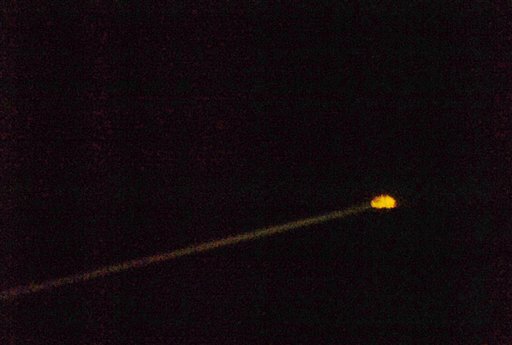 Photograph of the Stardust capsule as it travels eastward through the Earth's atmosphere on Sunday, January 15, 2006 over the skies of Utah. (AP Photo/Jose Carlos Fajardo)