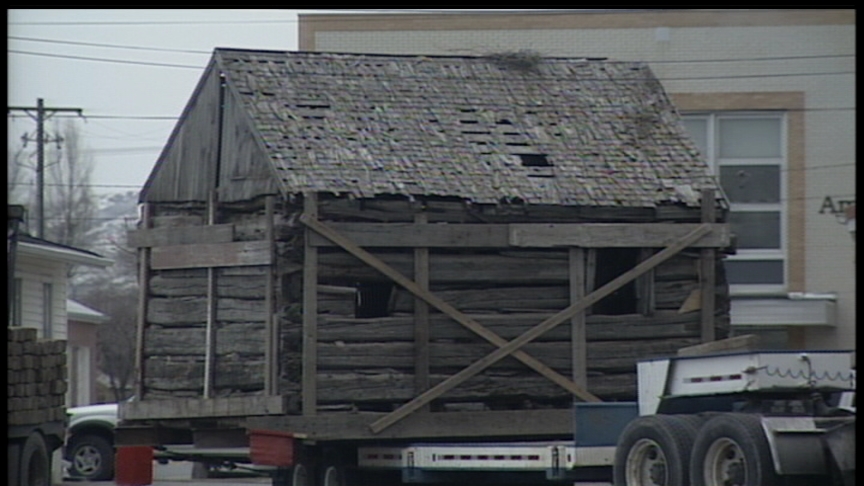 Preservationists Move Early Cabins to City Park