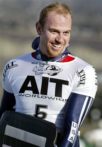 Zach Lund, of the United States, smiles after placing second at the men's World Cup skeleton in Calgary in this Nov. 10, 2005 file photo. Lund will apparently compete in next month's Turin Olympics after the U.S. Anti-Doping Agency chose Monday, Jan. 23, 2006, to only issue him a public warning following a failed drug test. Lund tested positive for Finasteride, a banned substance often used as a steroid-masking agent, at the World Cup in Calgary and was barred from the past two World Cup races. (AP Photo/Jeff McIntosh, CP)