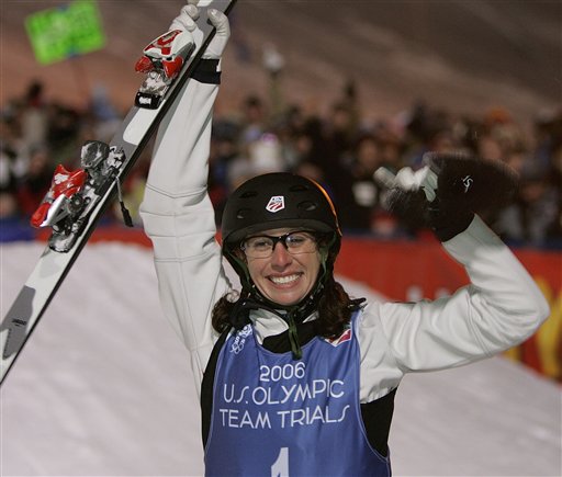 Emily Cook, of Park City, Utah, celebrates after she won a spot on the U.S. Olympic team during the U.S. Olympic Freestyle Aerials team trials in Steamboat, Colo., on Friday night, Dec. 30, 2005. (AP Photo/Ed Andrieski)