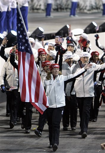 The United States Winter Olympic team, lead by flag-bearer Chris Witty, a speedskater, enter the stadium during the 2006 Winter Olympics opening ceremony Friday, Feb. 10, 2006, in Turin, Italy. (AP Photo/Eric Risberg)