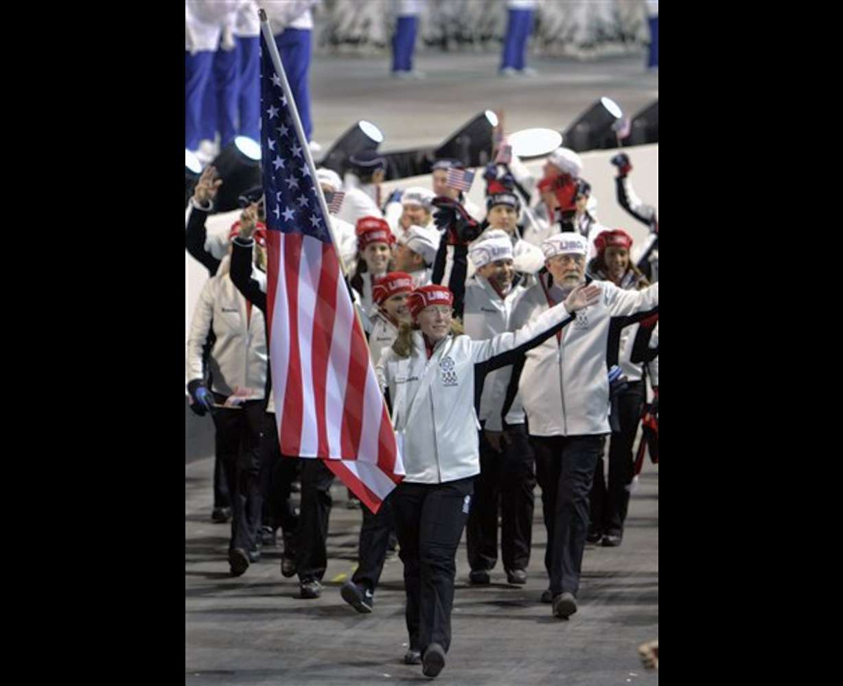 The United States Winter Olympic team, lead by flag-bearer Chris Witty, a speedskater, enter the stadium during the 2006 Winter Olympics opening ceremony Friday, Feb. 10, 2006, in Turin, Italy. (AP Photo/Eric Risberg)
