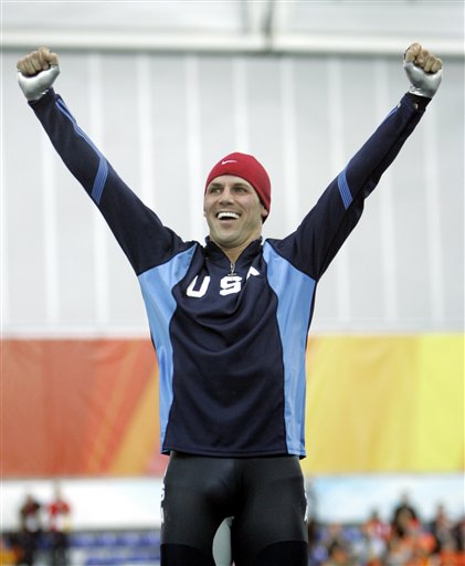 Gold medalist Chad Hedrick of the United States reacts during the presentation of the flowers to the medal winners at the men's 5000 meter speedskating at Oval Lingotto during the 2006 Winter Olympics in Turin, Italy on Saturday, Feb. 11, 2006. The medal ceremony will take place on Sunday. (AP Photo/Jasper Juinen)