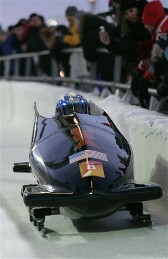 USA-2, piloed by Jean Prahm, front, with Vonetta Flowers on the brakes, starts its first run in Women's Bobsled at the Turin 2006 Winter Olympic Games at Cesana Pariol, Italy, Monday, Feb. 20, 2006. (AP Photo/Herbert Knosowski)