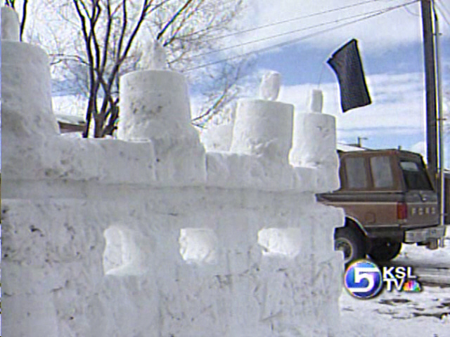 Public Admires Snow Castle on Redwood Road