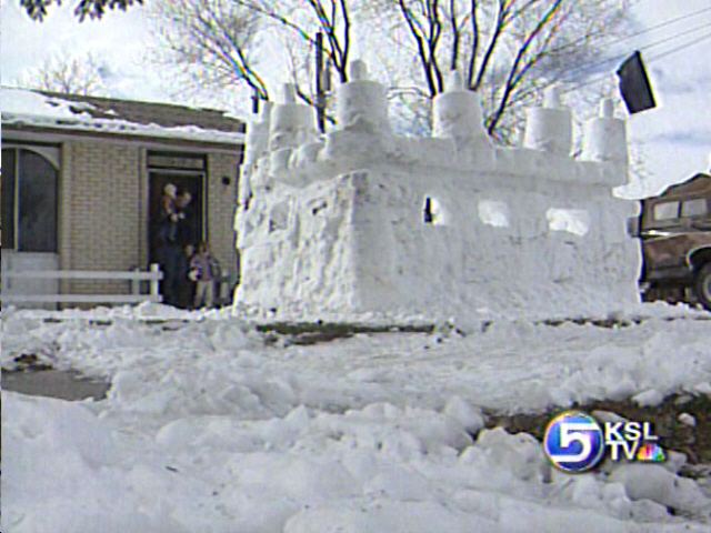 Public Admires Snow Castle on Redwood Road