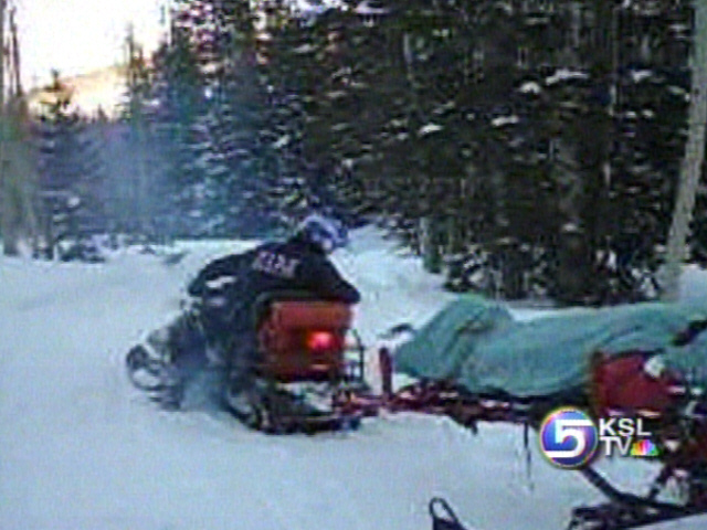 Man Rescued from Snowmobile Crash