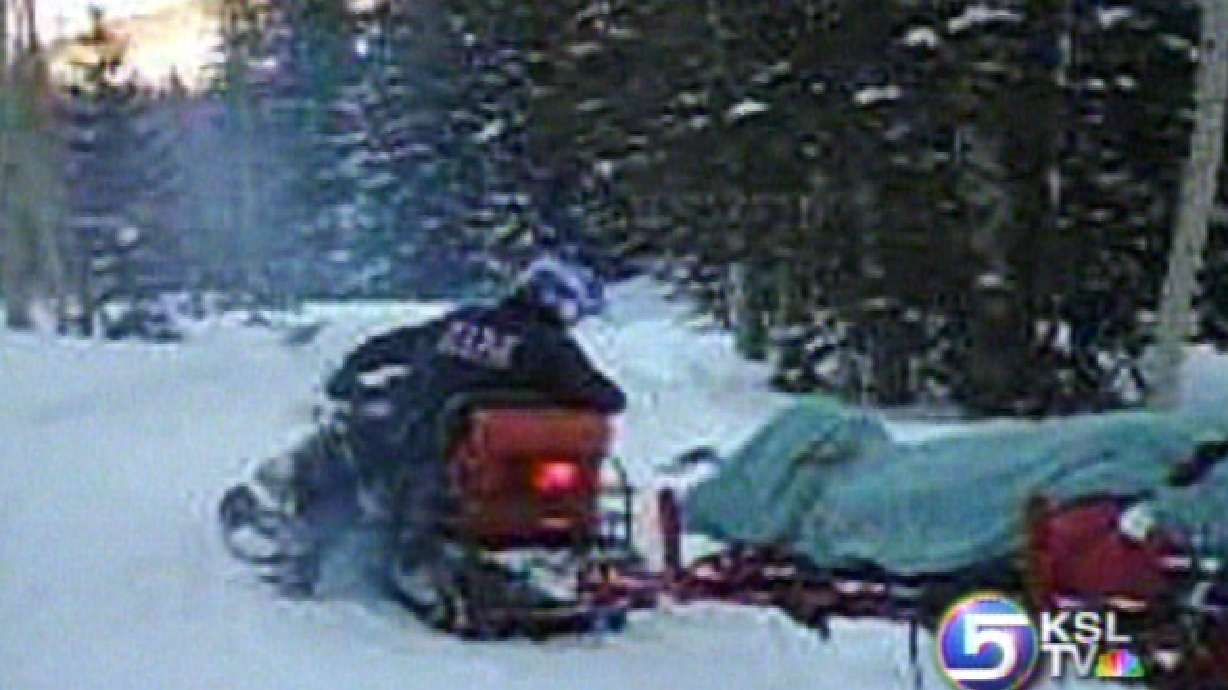 Man Rescued from Snowmobile Crash