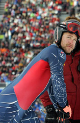 Bode Miller of the United States leaves the finish area after skiing out of the course during the first run of the Men's Giant Slalom.