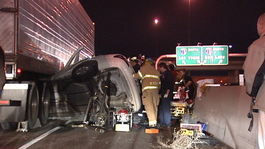 Car Dragged Under Semi, Driver Survives 