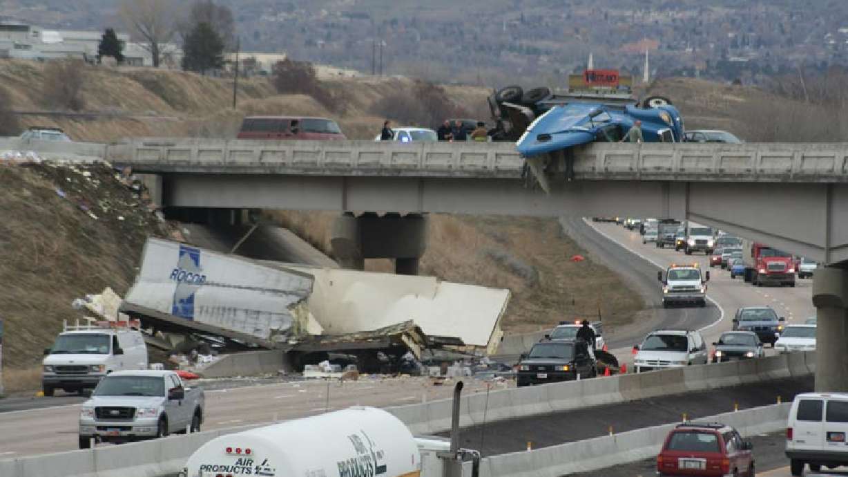 Semi Trailer Falls Off Overpass, Onto I-15