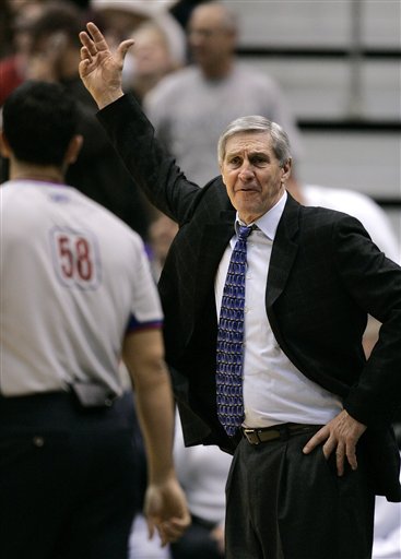 Utah Jazz head coach Jerry Sloan shows his displeasure with referee Zach Zarba (58) during the fourth quarter of an NBA basketball game against the Phoenix Suns Tuesday, March 21, 2006, in Salt Lake City. The Jazz beat the Suns, 107-99. (AP Photo/Douglas C. Pizac)