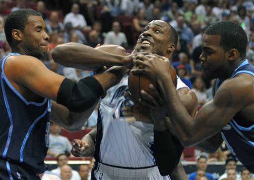 Howard's 28, 20 lead Magic over weary Jazz