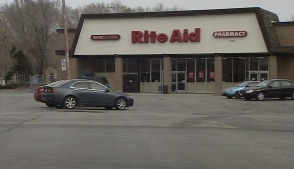 Pharmacy robber arrested; wife tipped police