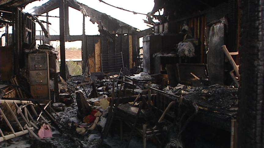 Firefighters Return Next Day to Extinguish Smoldering Roof