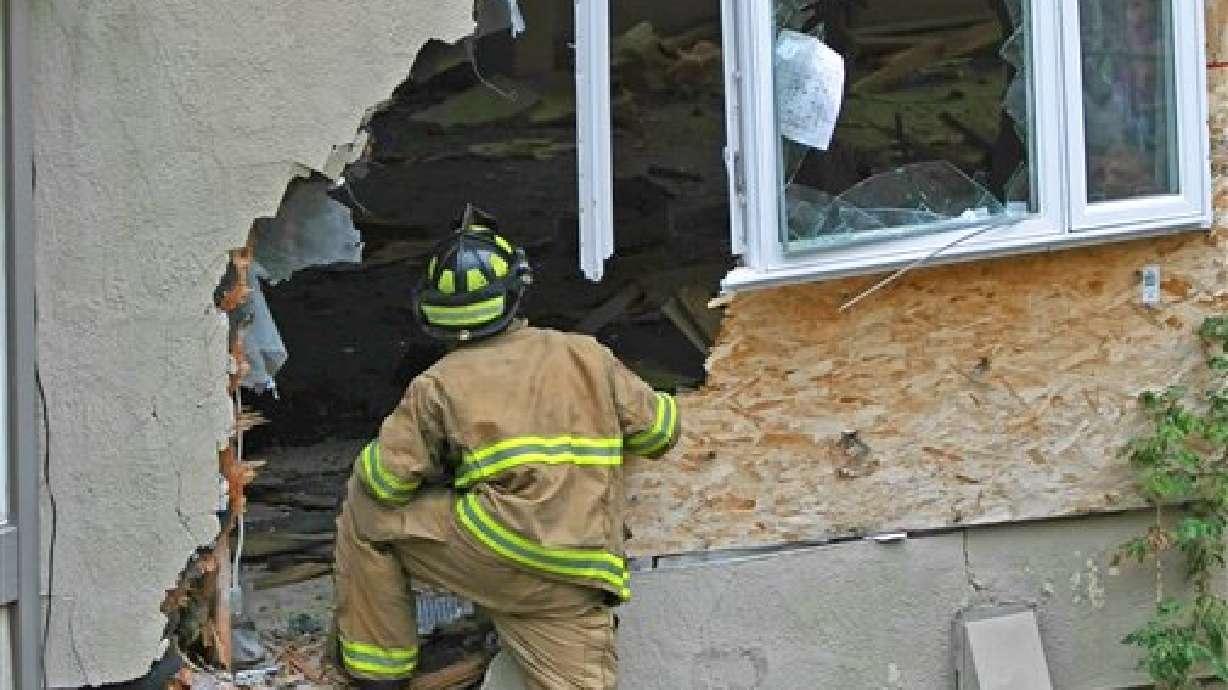 Boulder crashes into Provo home