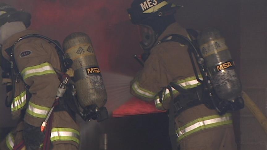 Firefighters Practicing Life-Saving Drills