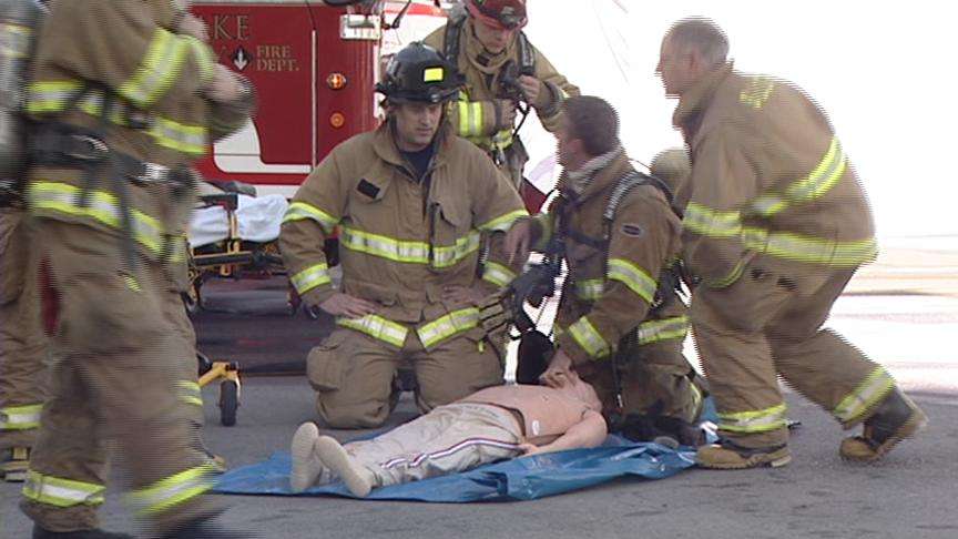 Firefighters Practicing Life-Saving Drills