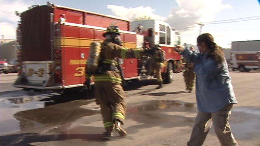 Firefighters Practicing Life-Saving Drills