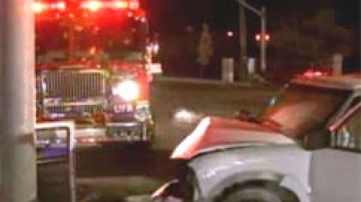 Two People Injured as Truck Hits Pole