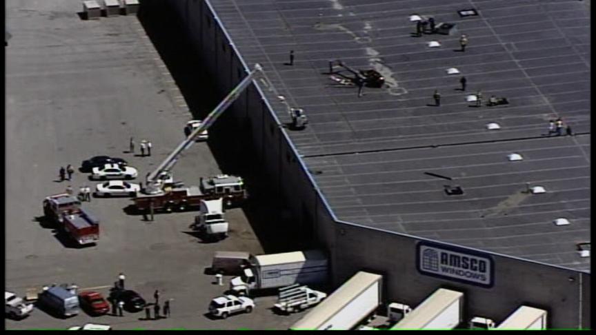 Helicopter Makes a Hard Landing on Roof of Business