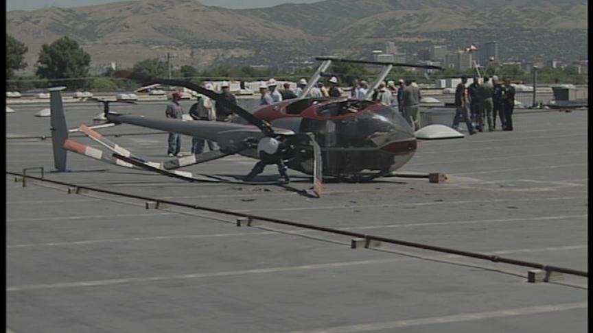 Helicopter Makes a Hard Landing on Roof of Business