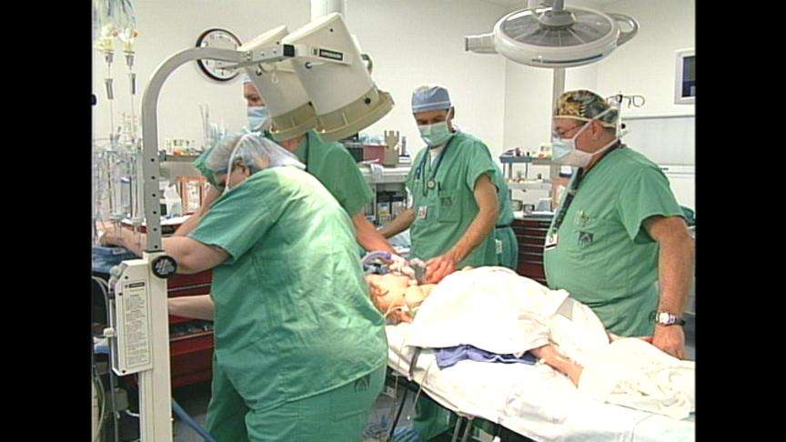 Doctors Preparing Conjoined Twins for Eventual Separation