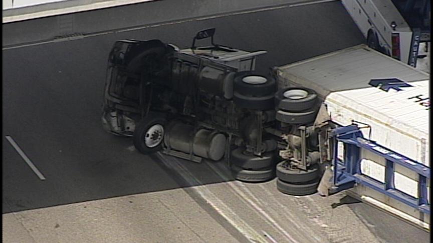 Semi Truck Rolls at I-15 and I-215 Junction