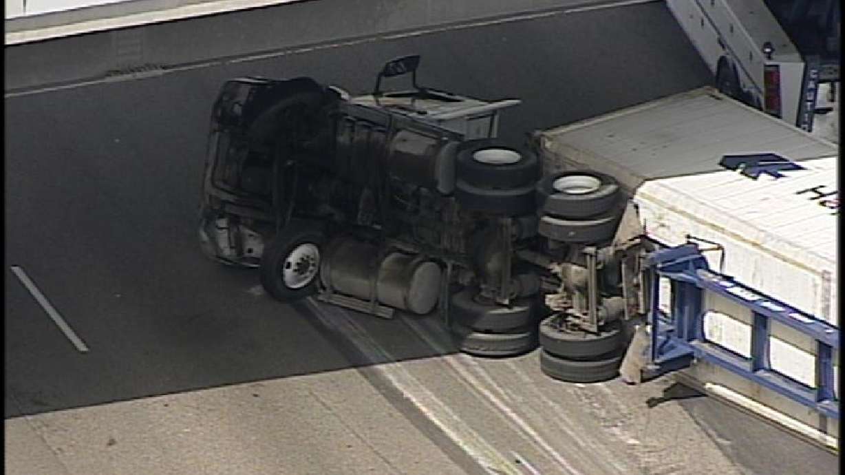 Semi Truck Rolls at I-15 and I-215 Junction