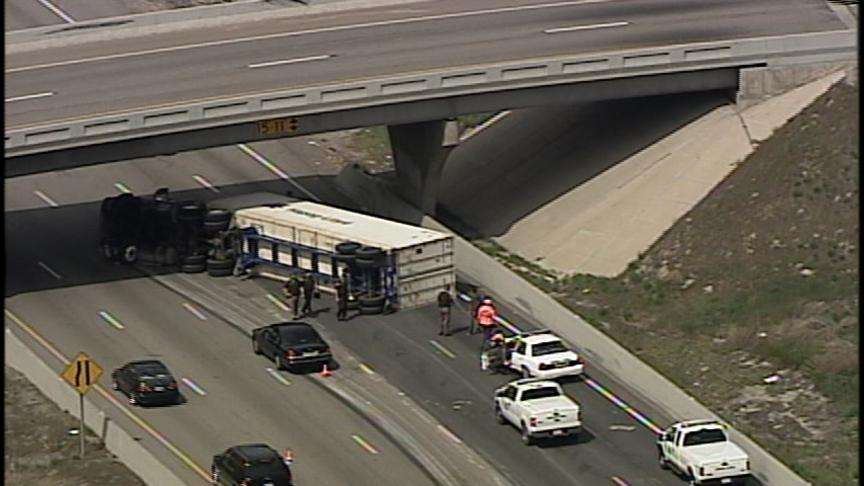 Semi Truck Rolls at I-15 and I-215 Junction