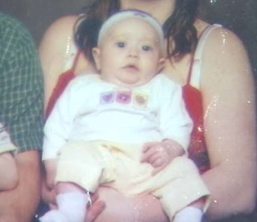 A baby picture of Kirsten, a 2-year-old girl who died Thursday night. Her mother is suspected of killing her.
