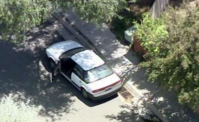 The robber abandoned the stolen car at 3745 S. 5120 West when the dye pack went off.