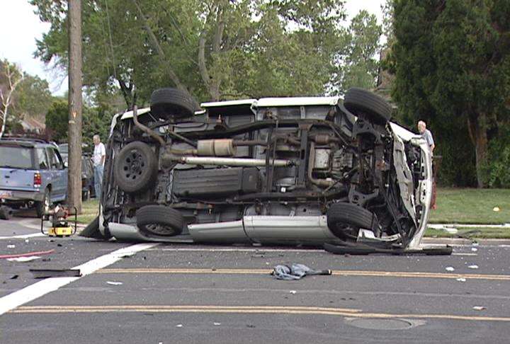 Car speeds through intersection, collides with van