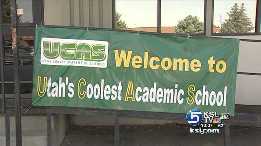 Charter school's students graduate with college degrees