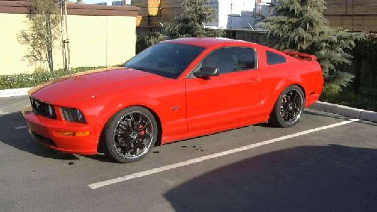 Police searching for stolen sports car, guns