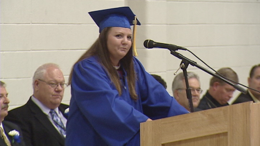 Melissa Christiansen, valedictorian of the South Park Academy class of 2009, graduating with both her high school and college diplomas.