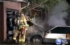 Fire Destroys Car in Driveway