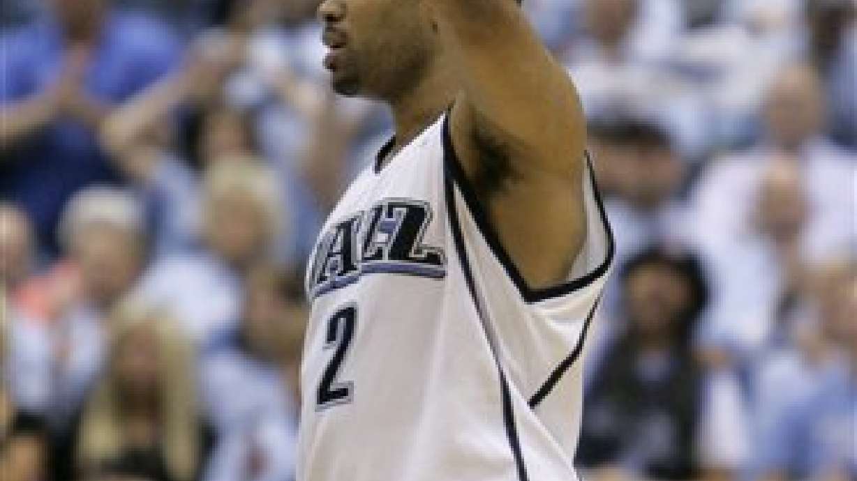 Fisher back with Jazz after exhausting week