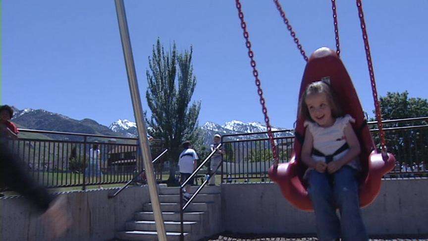 Special Swing Makes Recess Fun for Young Girl