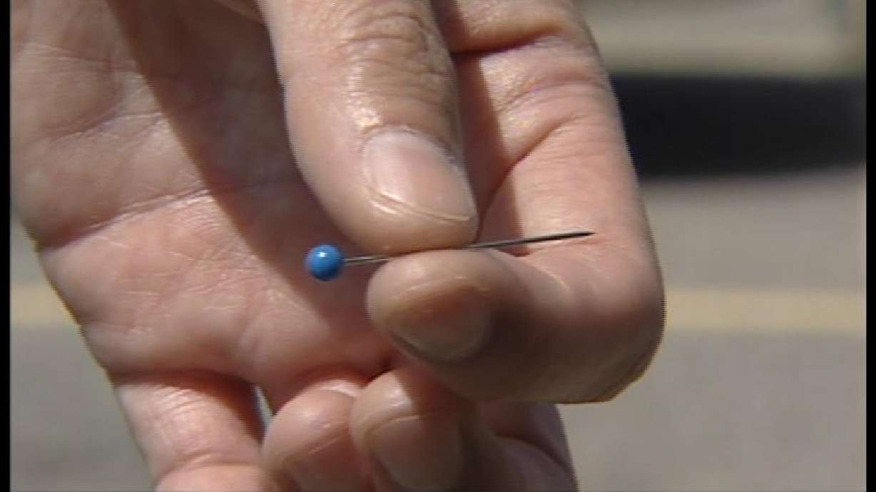 Seventh Grader Charged with Assault for Poking Classmates with Pin