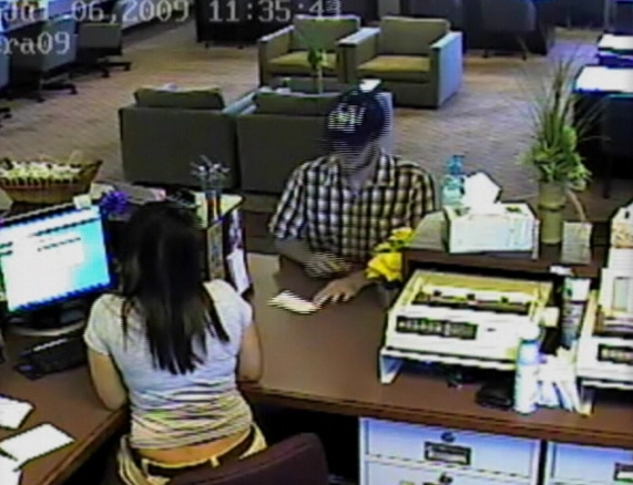 Bank robbery surveillance video released; teller talks about ordeal