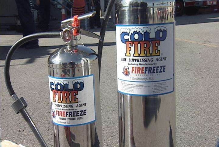 Emergency workers get a closer look at a new fire extinguisher