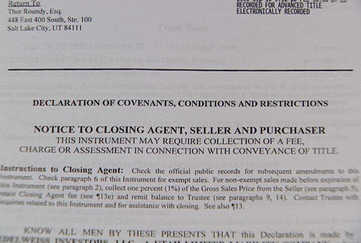 Hidden transfer fees tied to real estate; payout lasts 99 years