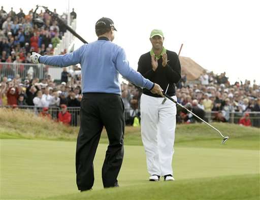 Tom Watson of the US, left, reacts after missing a putt, as Stewart Cink of the US, right, looks on, during a playoff following the final round of the British Open Golf championship, at the Turnberry golf course, Scotland, Sunday, July 19, 2009. (AP Photo/Matt Dunham)