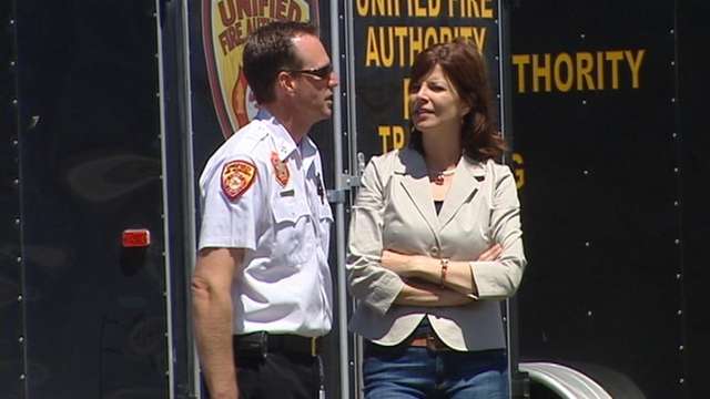Debbie Dujanovic speaking with Capt. Clint Smith from the Unified Fire Authority